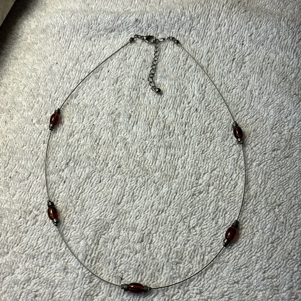 Silver tone & amber beads 16” to 18” extender. New condition.